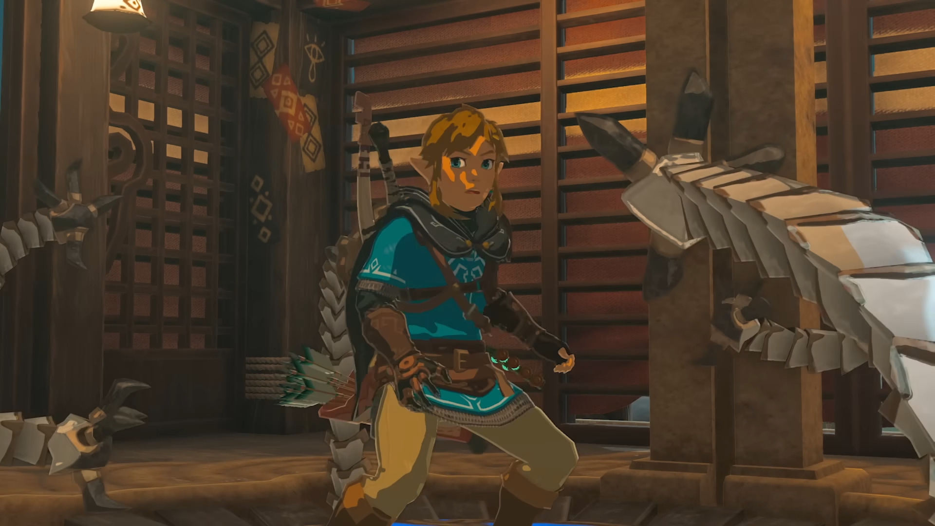 Link looking shocked, surrounded by the arms. He is inside what resembles a Sheikah building