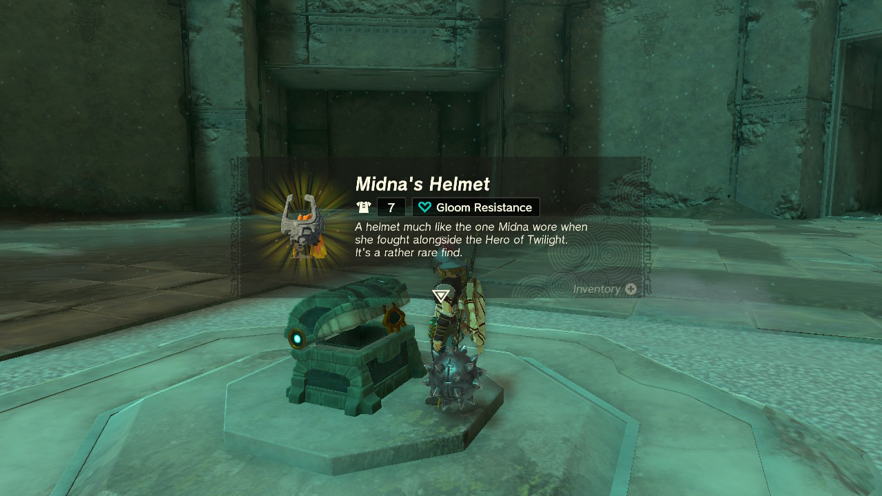 Link obtaining Midna's helmet. The description says, 'A helmet much like the one Midna wore when she fought alongside the Hero of Twilight.'