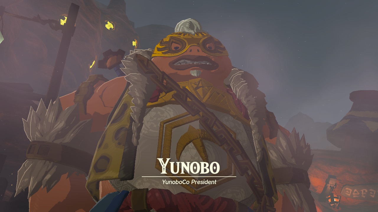 Yunobo sneers at the camera, wearing a gaudy gold mask