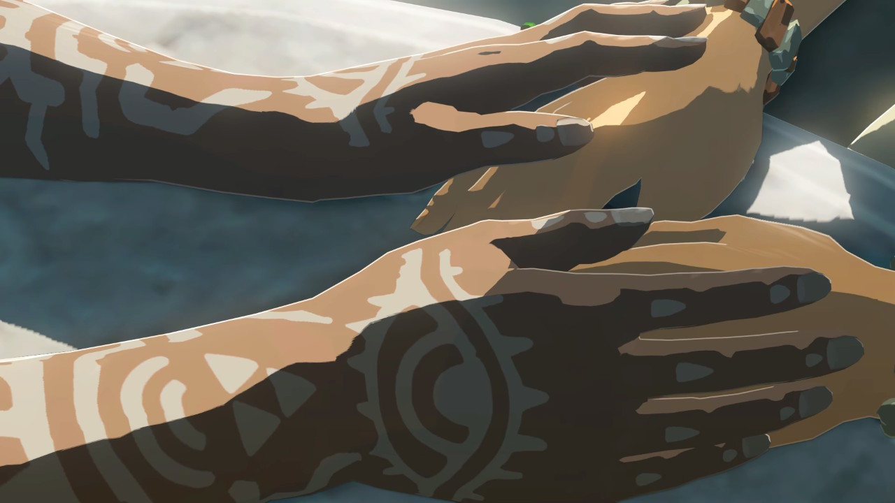 Sonia holds Zelda's hands comfortingly