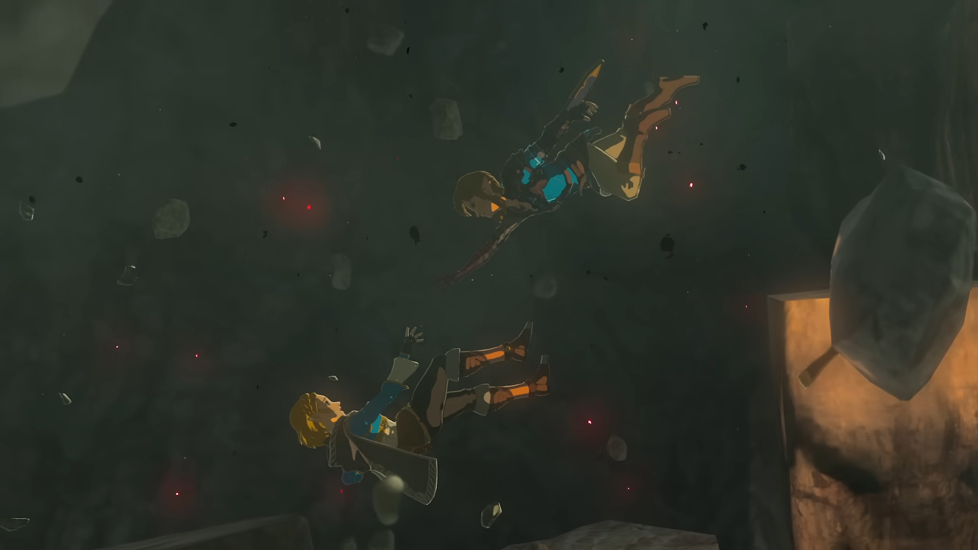 Link diving after Zelda, who is reaching out for him